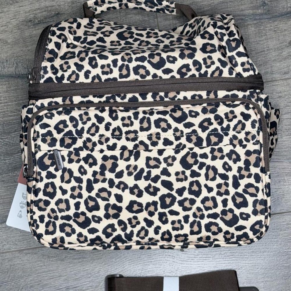Leopard print lunch bag with shoulder strap.